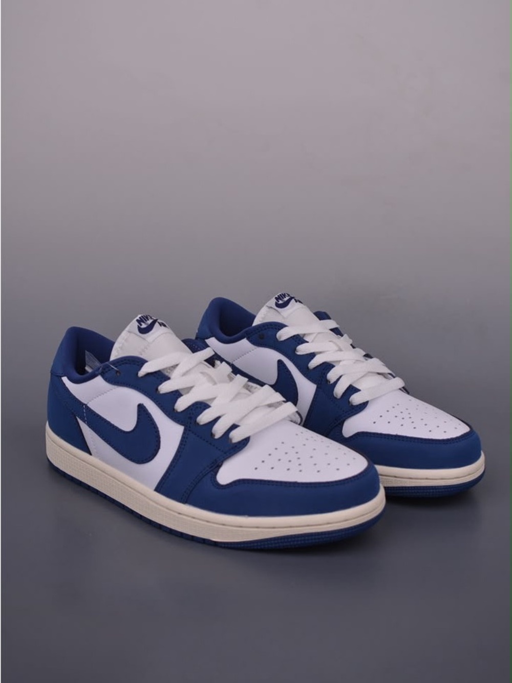 Nike Low-Top Sneakers in White and Royal Blue
